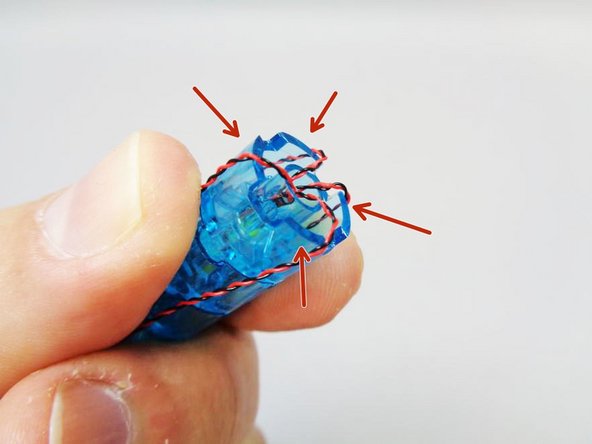 Take the pre-lit core that came with the Brickstuff kit, and carefully bend the four wires so they loop over the large flat portions of the core bottom piece.