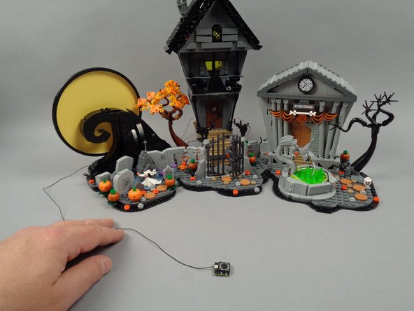 The button is the same size as a 2x2 LEGO plate, so you can also build your own custom housing for the button if desired.