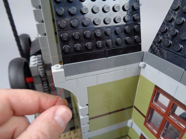 The first photo for this step shows what your wall section should look like after you have rebuilt it.