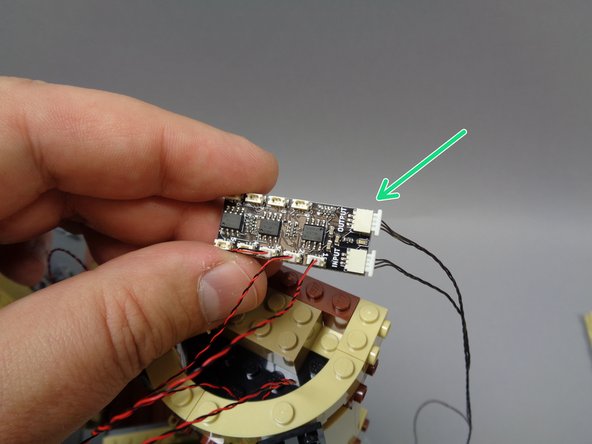 Remove the second 24&quot; 3-wire connecting cable (this may be BLACK or RED) from Bag 7, and connect it to the OUTPUT plug on the BRANCH09X adapter board as shown in the first photo (green arrow).