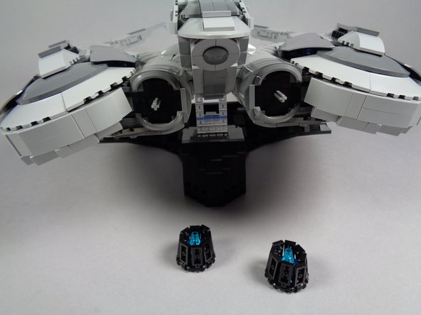 As shown in the third photo, open the plates around the engine core for both engine assemblies.