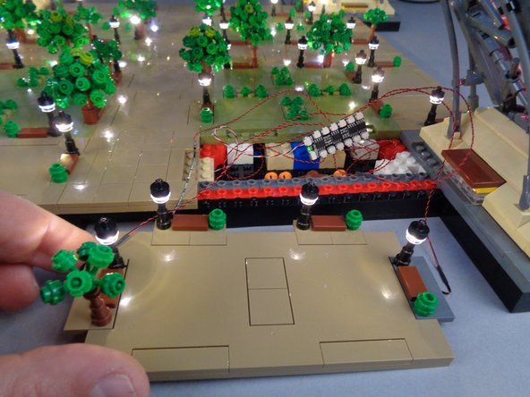 As shown in the photo for this step, connect the four lamp posts on Panel 4F to the last four available plugs on the BRANCH12X driver board.