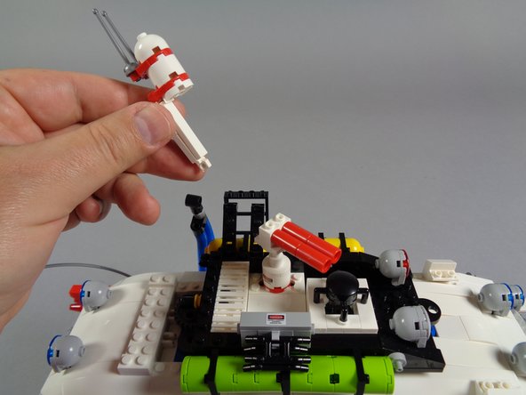 As shown in the second photo, remove the radome assembly, including the mounting pillar and small antennas.