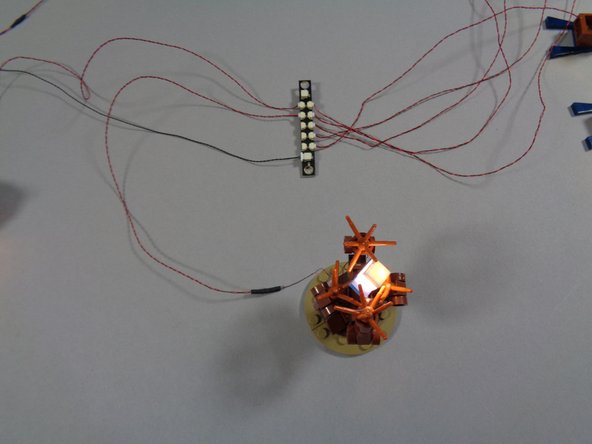 Connect the Whomping Willow light to any of the open small plugs on the adapter board as shown in the photo.  The light inside the car should turn on.