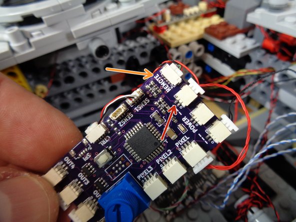 One plug is larger and has two wires (one red and one black).