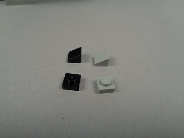 The LEGO parts for this step are taken from the extra parts provided in your original LEGO set.  They are not included with your light kit.