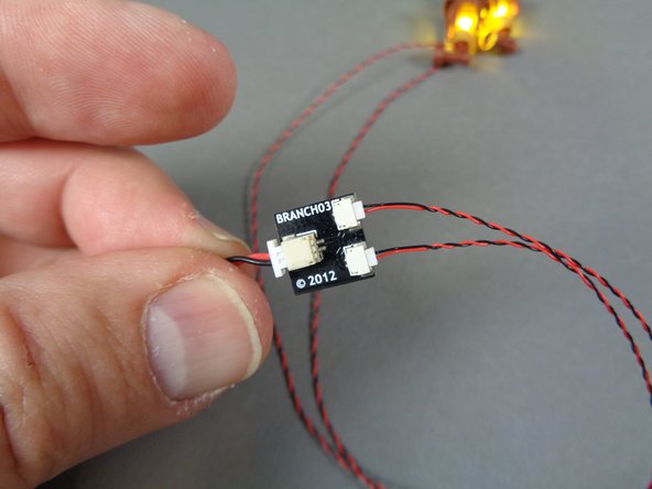 As shown in the first photo, take the USB power cable from the box labeled &quot;Remote Control and Power,&quot; connect it to a mains adapter or USB battery bank, and connect the Brickstuff power plug to the large connector on the BRANCH03/A3 adapter board.