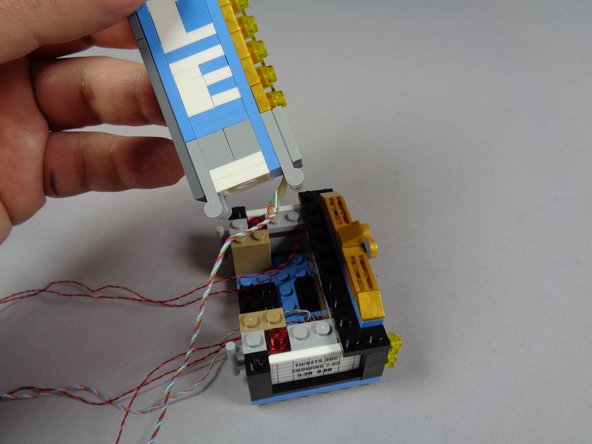 Next you will carefully re-attach the marquee top.