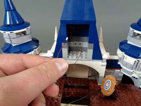 When re-attaching the clock and re-assembling the roof sections above it, make sure the LED light wire passes back and runs between, not on top of, studs.