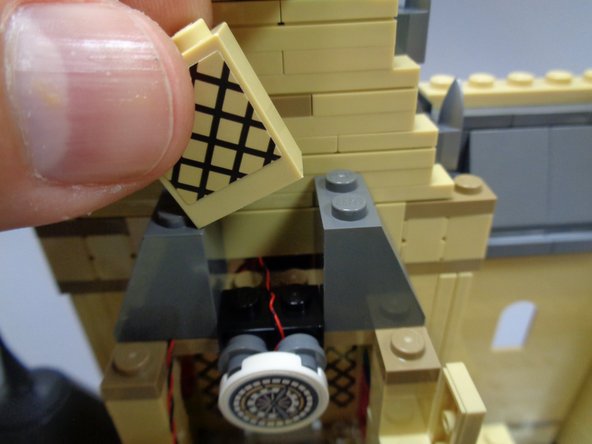 Follow the steps as shown in the photos to re-assemble the clock tower.