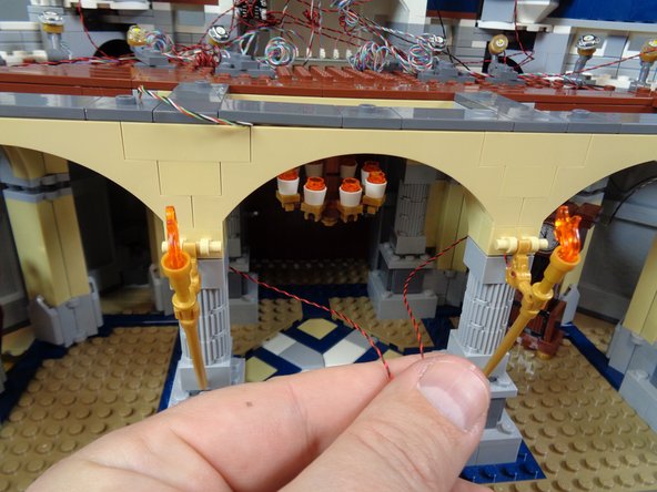 When re-attaching the pillar, make sure the light wire runs between, not on top of, any studs.