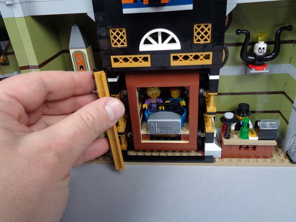 Test the elevator movement to make sure it moves up the shaft and falls back to the bottom without stopping or getting caught on either wires or the light strips.