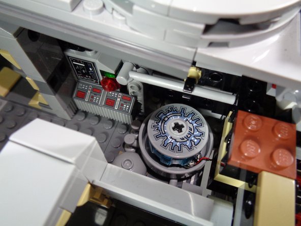 Bend the hyperdrive power wires as shown in the second photo, so the hyperdrive unit sits flat inside the Technic hub.