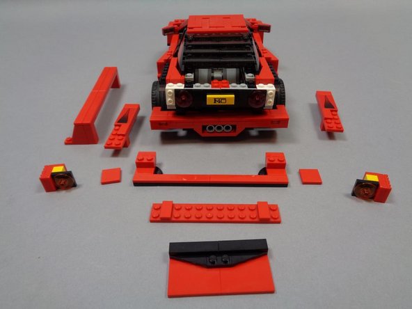 As shown in the photo, carefully remove the parts shown to expose the tail light assembly.