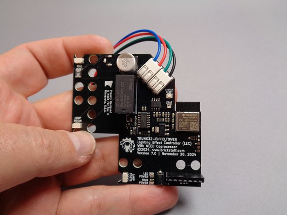 Remove the main controller from its bag.