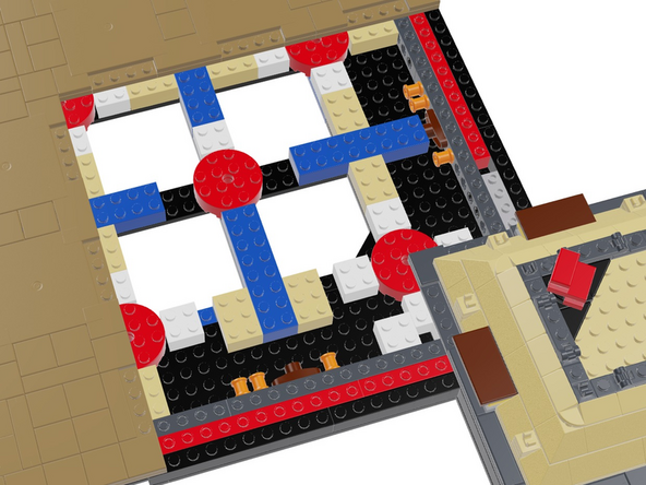 The two red arrows point to where two white 2x2 bricks should be removed. In a later step, you will re-attach these bricks to the bottom of the Section 4 plate you removed earlier.