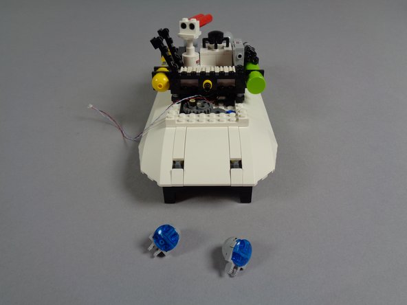 Now you will prepare the rear section of the roof, which is where the lighting control adapter will sit and where all of the roof LED lights will connect.