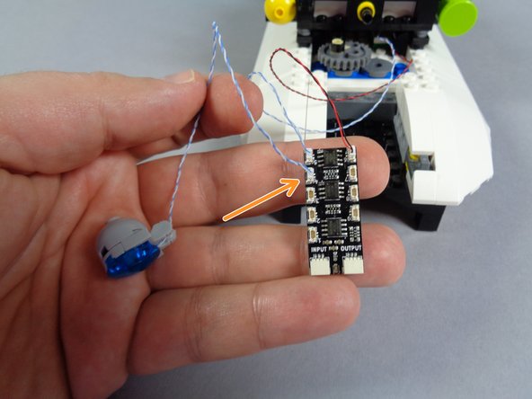 Next you will connect the two rear blue roof lights to the BRANCH09X adapter.