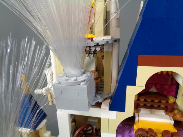 The photos in this step show some possible places to attach your three fireworks cubes.