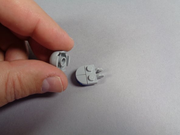 The green line in the second photo shows the path the light wires will take once the light has been mounted and re-attached.