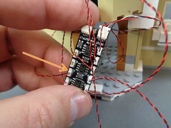 If you chose not to complete the disassembly of the front of the castle, you will pull the light wire down directly into the kitchen.