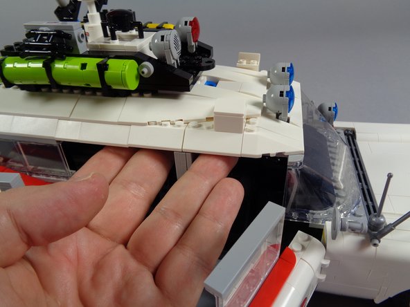 Because the roof of the Ecto-1 is built in two sections, you will remove it in two sections, beginning with the rear section.