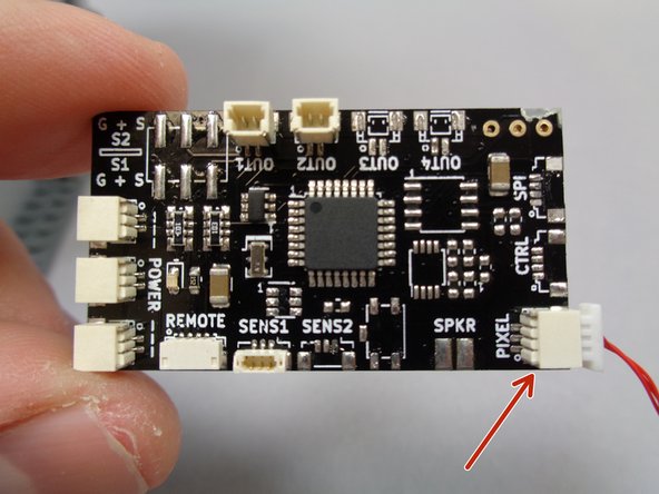 Remove the TRUNK08 master controller from Bag 1.