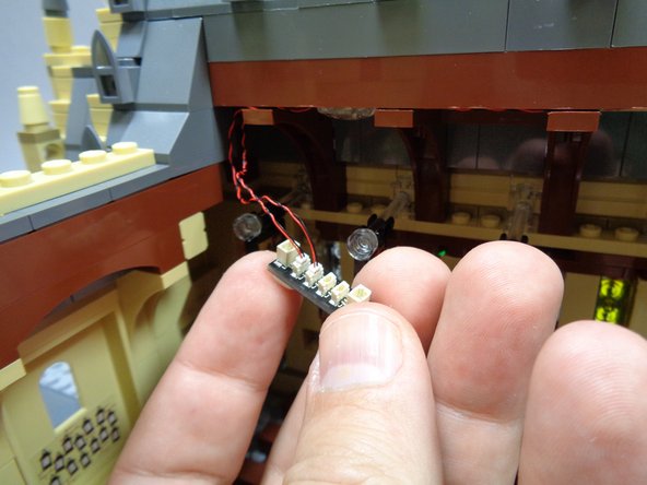 Make sure the light wires do not run on top of any studs when re-attaching the roof to the braces.  All wires should always run next to or between studs.