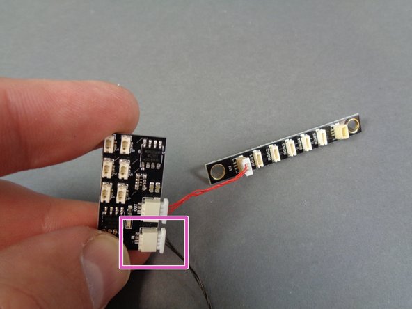 Depending on when your kit was manufactured, one of the long wires may be red.