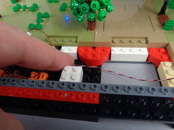 Make sure the control cable runs between, not on top of, any studs.