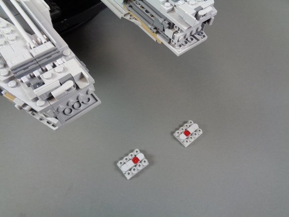 Next, you will attach the pre-lit mandibles and connect them.