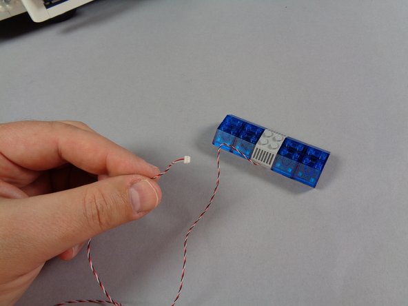 Now you will route the control wire for the rear lightbar.