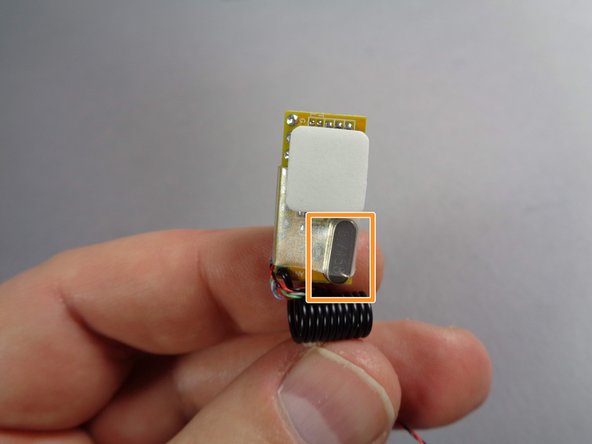 Remove the parts from the remote bag.  The second photo shows the RF receiver with its two wires (one for power and the other for control).