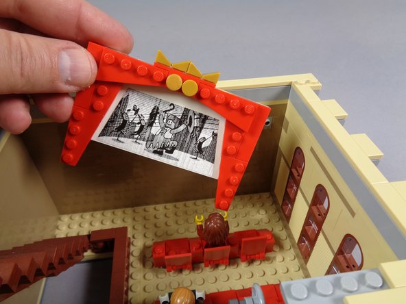 As shown by the first photo in this step, remove the entire cinema frame assembly as shown.