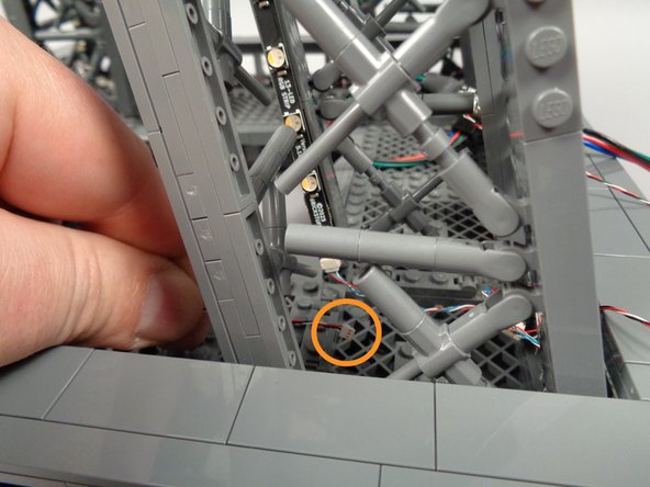 As shown by the orange circle in the third photo, make sure the control cable can reach all the way into the center of the first pillar.