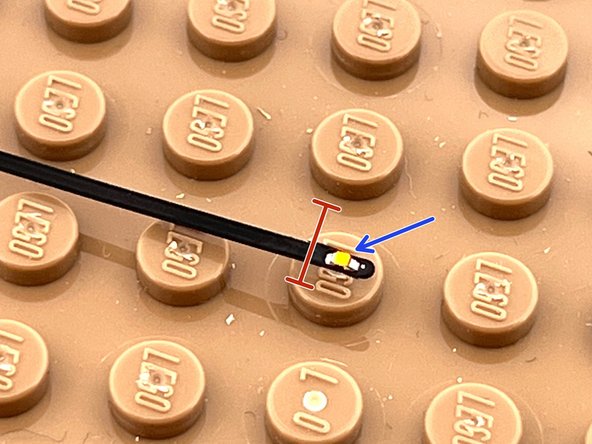 As you can see in the first photo, the end of the Microflex LED light will need to be bent slightly to allow the top plate to attach as shown in the second photo.