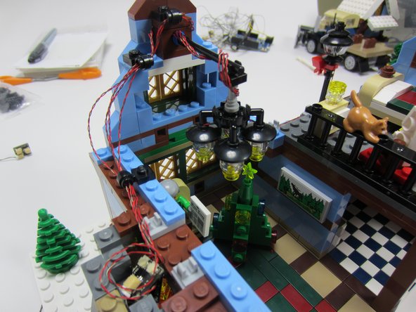 Connect the four chandelier light wires to two A3 adapter boards.