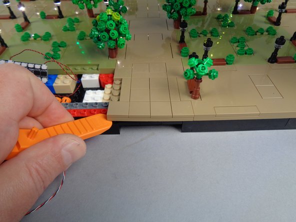 As shown in the second and third photos for this step, remove the small panel between Panel 3F and Panel 4F.