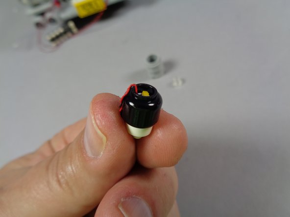 The third photo shows how the LED should be positioned: as close to &quot;flat&quot; as possible, so the light will still shine straight.  If the LED board does not sit straight inside the black part, and either goes too far down inside the part or bends at an angle, the headlight will not be bright when you re-assemble everything.