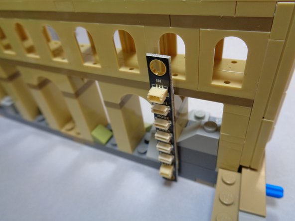 You can now take the second BRANCH17 adapter board and remaining five color-changing spotlights from Bag 11 and mount these on the second half of the castle.