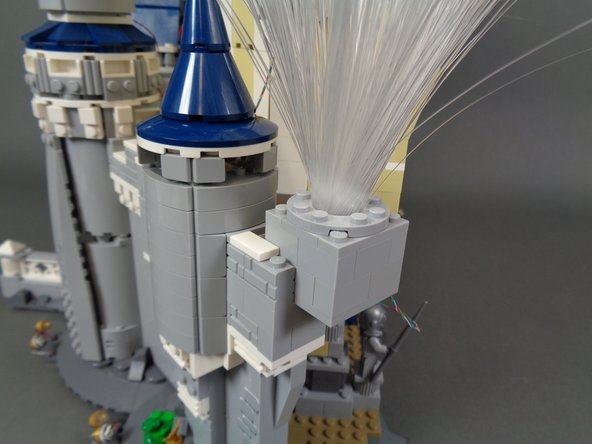 Exact placement of the fireworks cubes is not critical.  Place them wherever you think looks best on your castle.