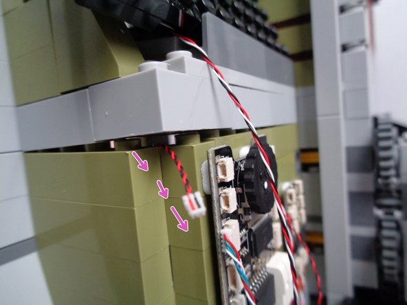 See the third photo for this step to see where the light should be mounted.