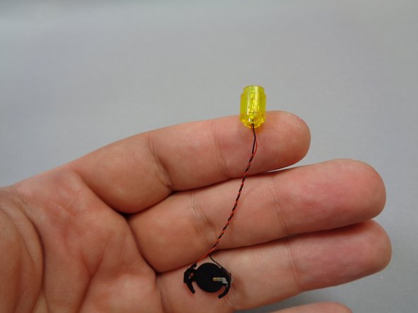 For each of the five boats, remove the lantern and battery assembly from its bag.