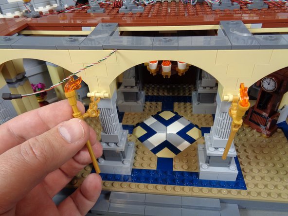 As shown in the first photo for this step, you can replace the two knight statues.