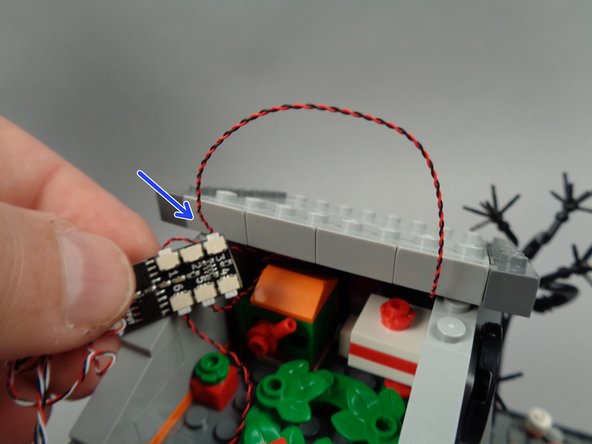 Make sure the green roof LED light is positioned at the front of the town hall, as shown by the green circle in the first photo.