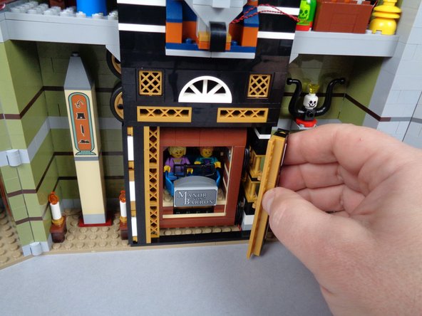 If you have not used the elevator function in some time, you may find the movement of the large gears and wheels designed by LEGO to slow the elevator may have become harder to move, resulting in your elevator not falling all the way to the bottom of the shaft.