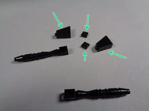 As shown by the green arrows in the third photo, separate these four parts from the guns and keep them.  You can set aside the old guns.