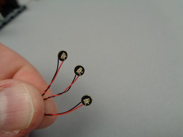 Next you will prepare the three yellow LED lights inside the small bag with the yellow dot.