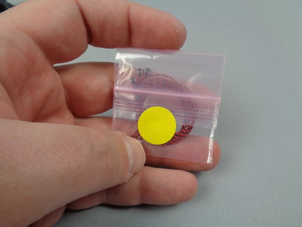 Next you will prepare the three yellow LED lights inside the small bag with the yellow dot.