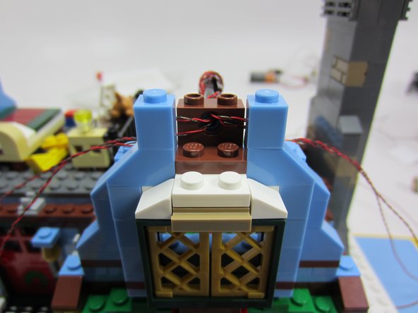 This step may drive you mad.  You will need to apply considerable force to get the brown bricks to stick together in the chandelier assembly.  Hang in there!